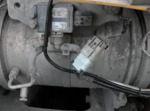 Emplacement de la pompe DPF/SCR sur Komatsu D61PX