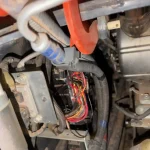 Kubota SVL95-2 V3800 engine wiring harness during 4DPF emulator installation