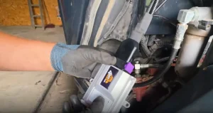 4DPF delete kit device being installed on a Yanmar ViO80 excavator