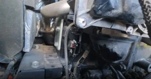 First exhaust temperature sensor location on Yanmar ViO80 during delete kit installation